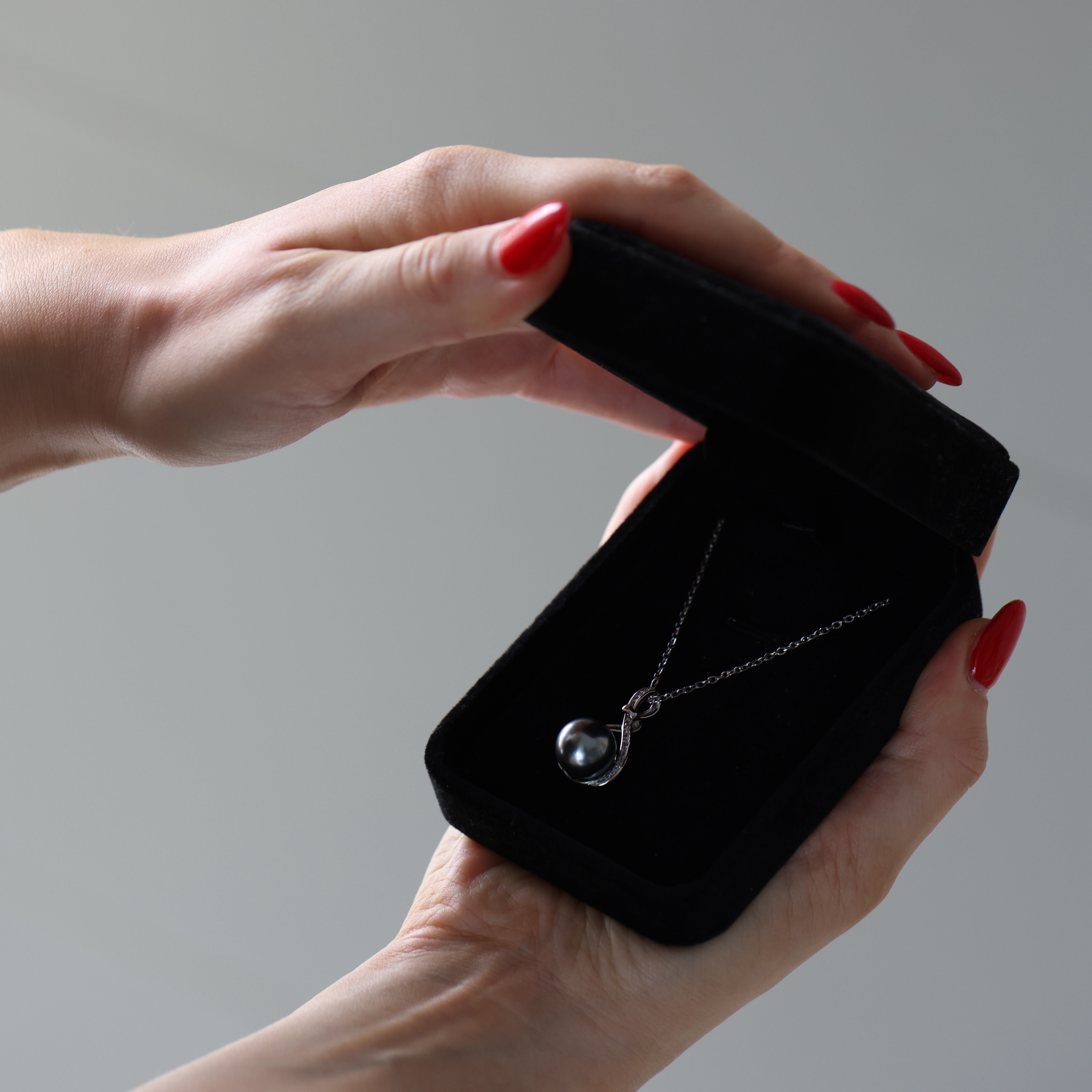 Intertwined Real Tahitian Black Pearl Pendant Necklace set in 925 Sterling Silver, Gift-Ready and Delivered Fast—perfect for a last-minute gift.